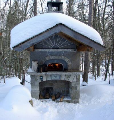 We make pizza in winter too - Pizza Oven with Snow on it
